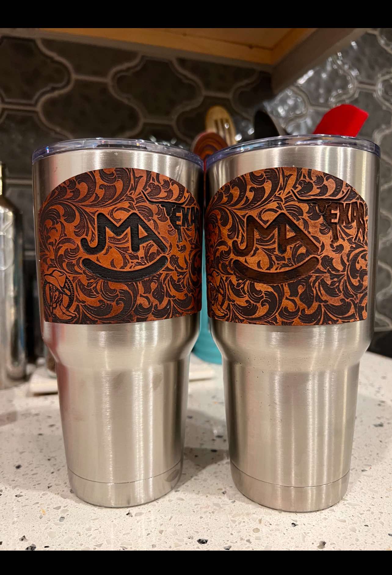 Leather wrapped drink tumblers